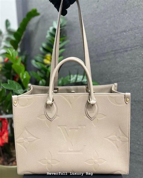 lv tourterelle|Onthego MM Monogram Empreinte Leather .